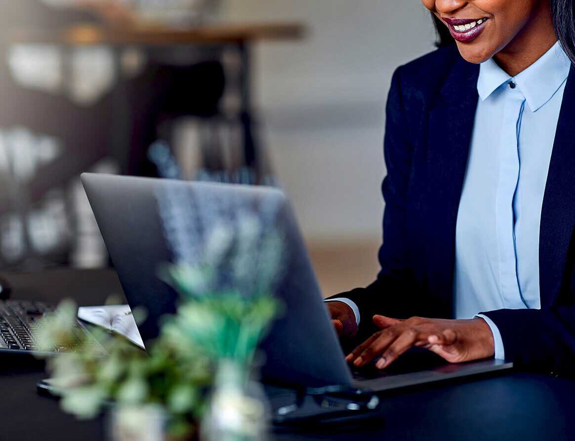 Tax professional working on a laptop